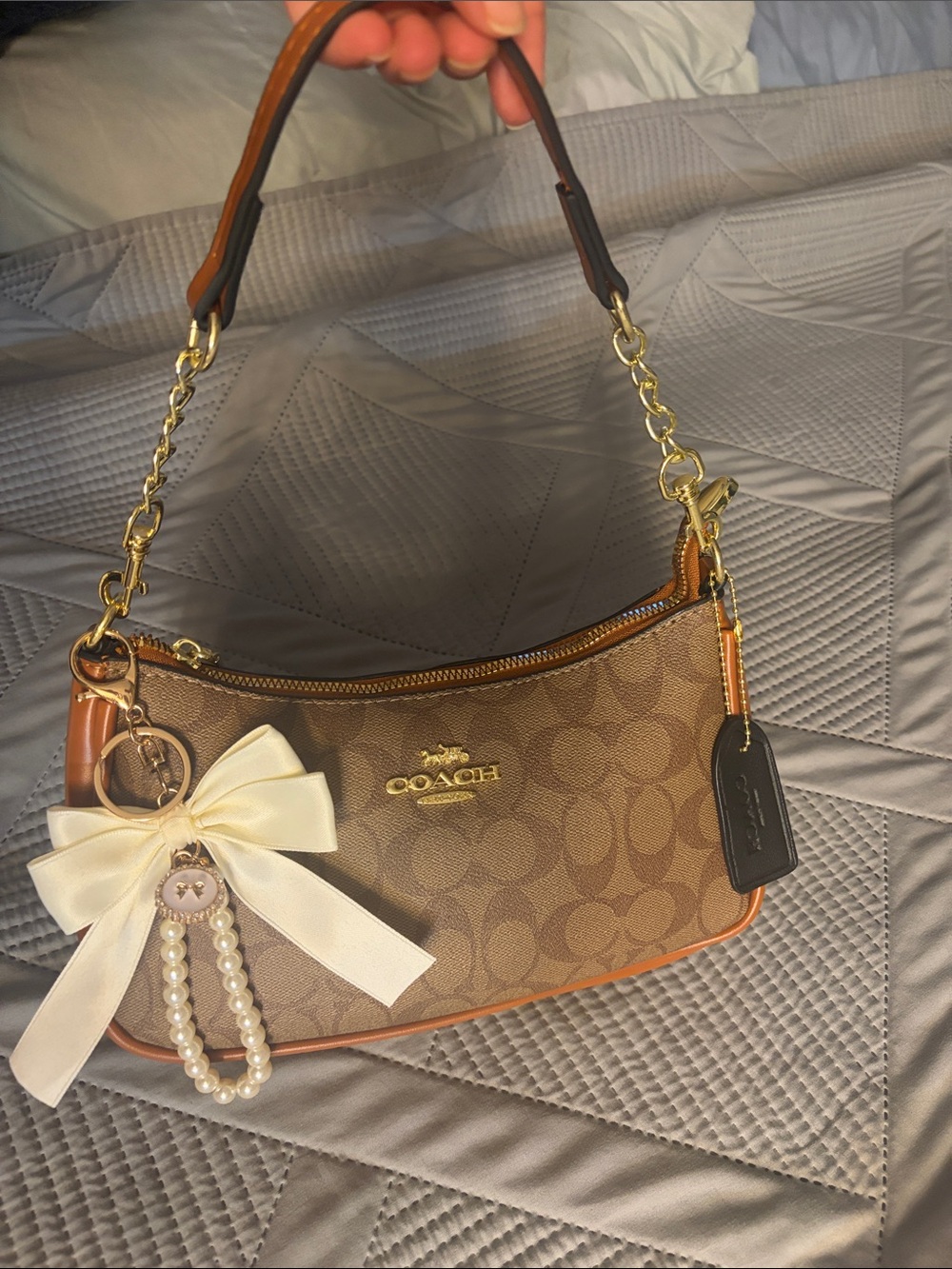 Coach Brown Signature Mini Bag with Gold Hardware and Cream Bow